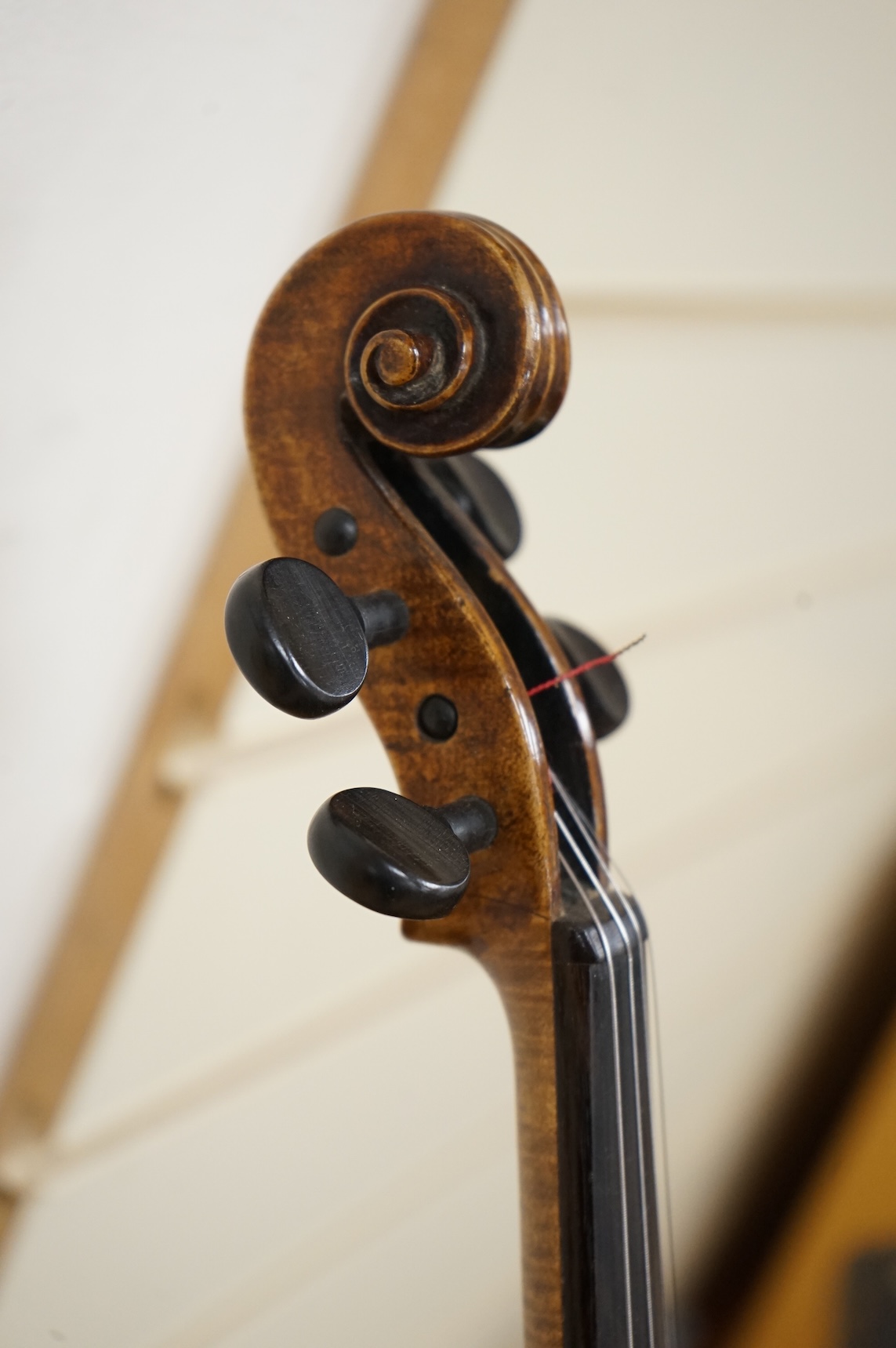 A late 19th century violin, with label for J.B. Schweitzer, 7/8 size, no bow, in case